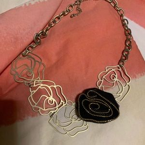 Polished gold rosette necklace with zip detail